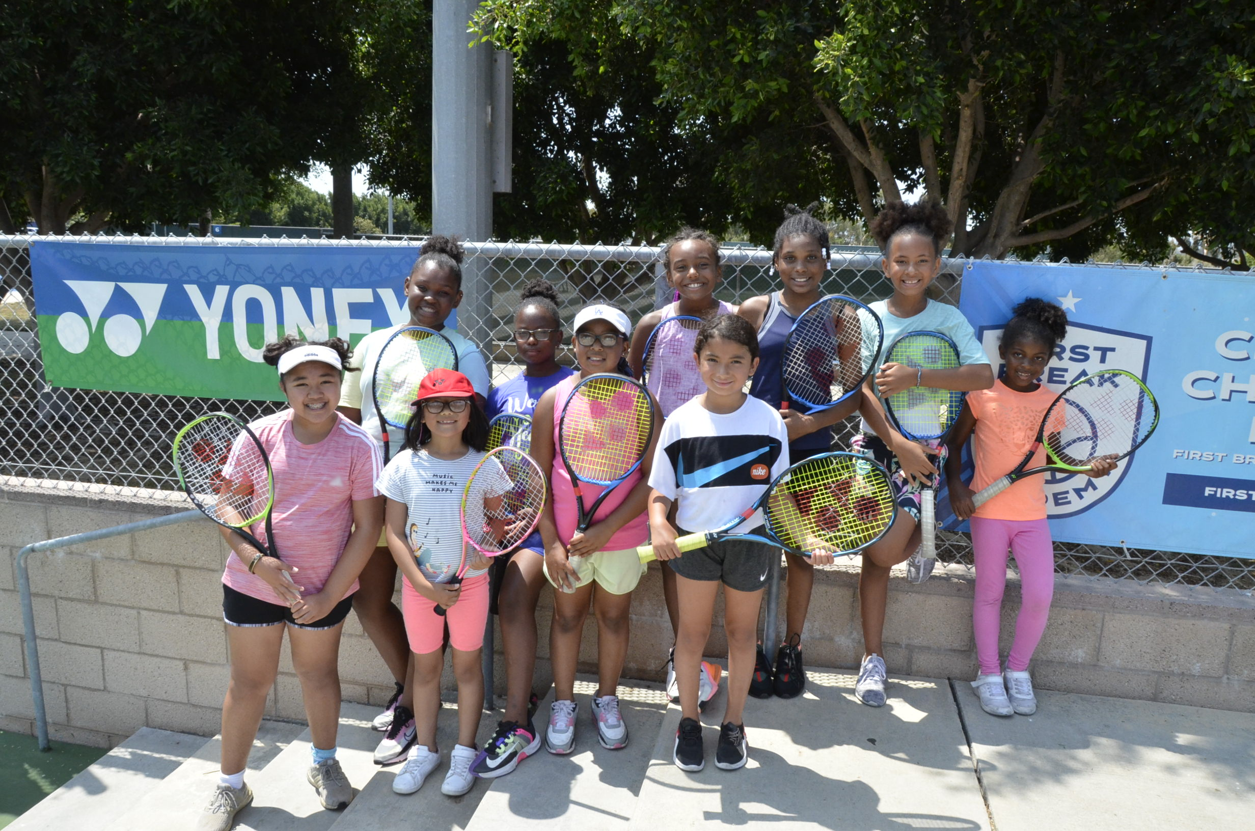 Group if tennis girls smile