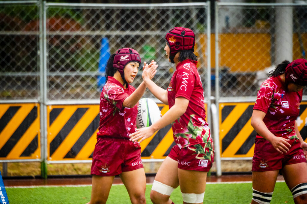 Rugby girls high five