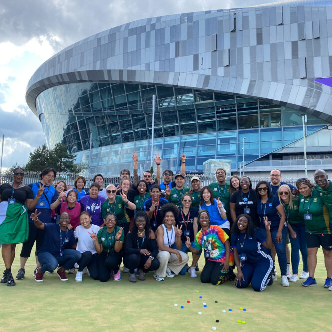 Group photo of Summit participants after playing sport