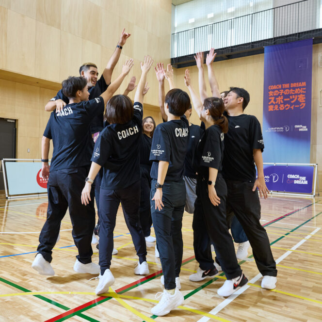 Coaches form a huddle