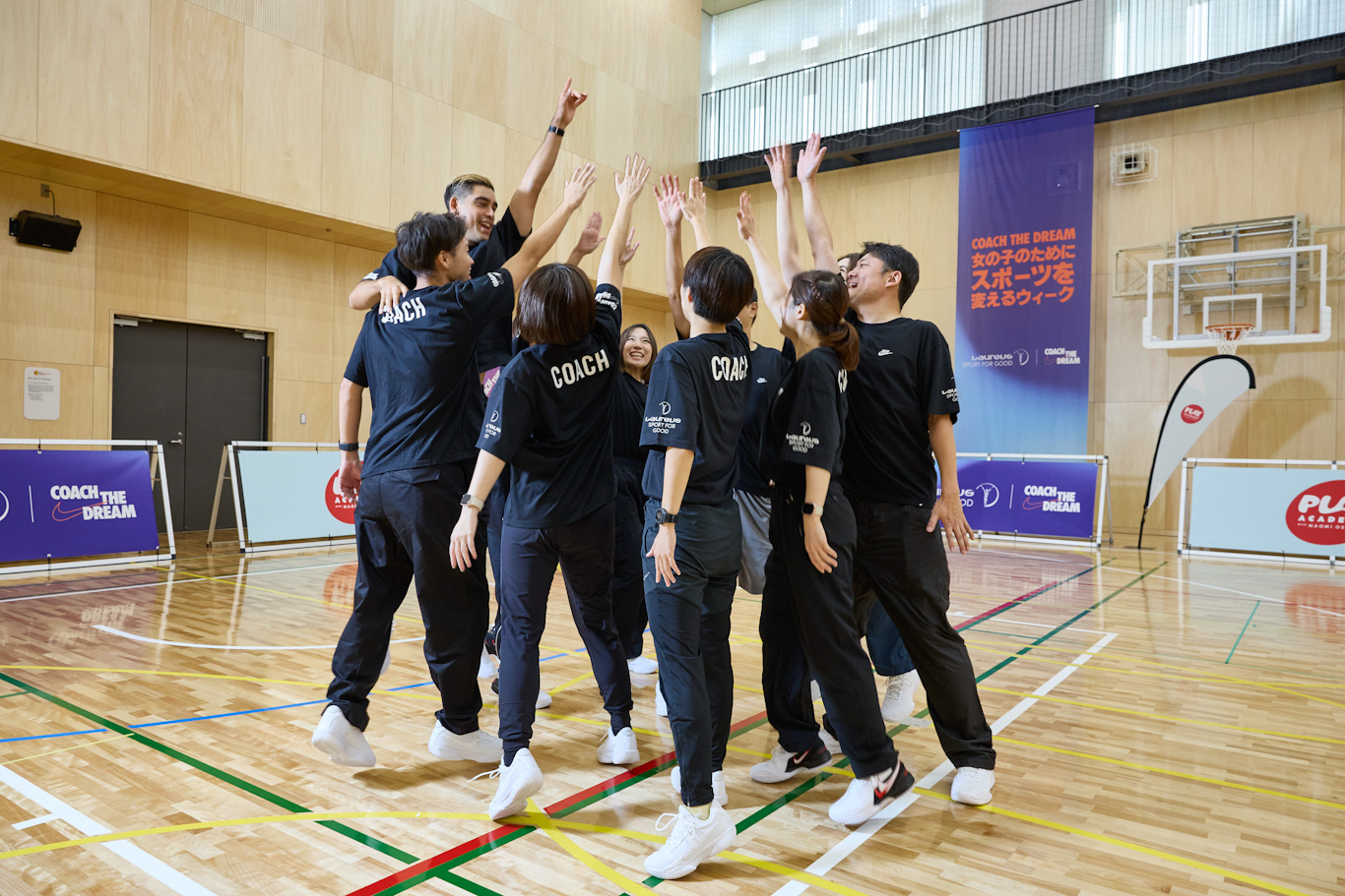 Coaches form a huddle